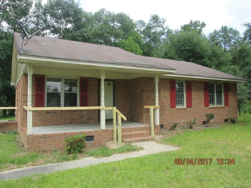 Great full brick ranch close to half an acre! This property backs up to J E Powe pond. Beautiful views from rear yard. Kitchen with ample amount of cabinet space and bright dining area that overlooks the backyard! Great starter home just add your personal touch!