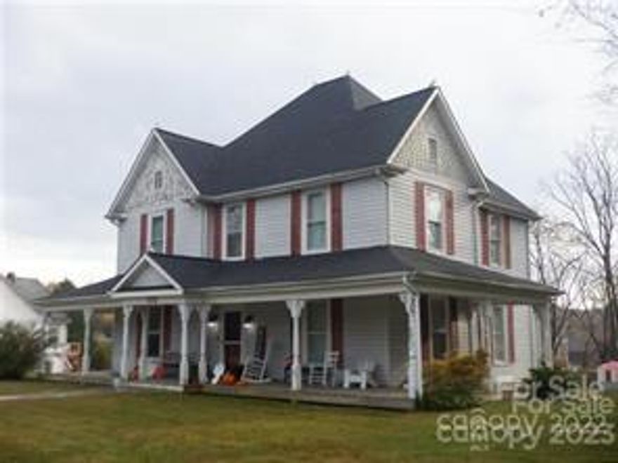 Check out this charming and historic 1906 home, full of character and original charm! Located just down the road from Lower Creek Elementary School, this 4 bedroom, 2 bathroom property boasts a wrap-around front porch, a convenient back deck, and a serene outdoor area. While offering all the convenience of modern living, this home may benefit from some updates and remodeling to fully realize its potential. You'll be minutes away from all the amenities Lenoir has to offer and a quick trip to the breathtaking mountains. The main floor features a spacious living room, a sitting room, a kitchen, a dining room, a full bathroom, a laundry room, and a service porch, as well as an additional room waiting to be converted into an office or a library. Upstairs, the master bedroom with an en-suite bathroom, and three additional spacious bedrooms await you. Don't miss this opportunity to make this house your new home, steeped in history and character!