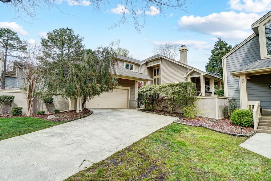 Meticulously maintained cul-de-sac home in desirable Welwyn neighborhood! You'll love this open floor plan w/cathedral ceilings and tons of natural light flowing across the neutral tones in this home. Living room w/wood-burning fireplace & window wall leading to the outdoor deck and lush nature views. Upgraded kitchen features SS appliances, upgraded custom cabinetry, granite countertops & breakfast area. Dining room features a wet bar area, perfect for entertaining! Primary suite on the main level with plantation shutters, custom closet & upgraded bath w/oversized, tiled shower & separate tub. Secondary bedrooms on upper level plus bath w/ dual vanities & shower/tub combo. Step out onto the wrap-around wood deck that offers ample space for entertaining or relaxing to the sounds and lush nature views. 2-car garage with plenty of room for storage. Lawn maintenance & trash included in HOA. Enjoy proximity to the Greenway, UNCC & University City & just 20 minutes to Uptown Charlotte!