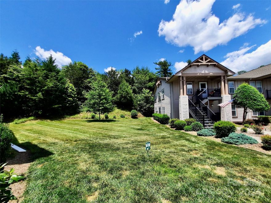 Wonderful, sunny end unit main level condo with great green space between it and next building and updated move-in condition too!  No steps in, gorgeous open kitchen with maple shaker style cabinetry, high end granite and open to the Great Room. New appliances in 2019 and 2023. Gleaming easy care pecan laminate flooring, sunroom/bonus room w/pocket doors and closet which can be used as 3rd bedroom for guests, has built in bookcases too. GR with wall of windows, gas fireplace for those winter nights, 65 inch TV stays, master bedroom and bonus room has wooded view.  2 pets allowed under 35 lbs.  Gated Wolfpen is most desireable with heated pool, tennis & pickleball, putting green, monthly dinners, be as sociable as you like!
Great walking neighborhood, minutes to shopping and x-pressway, less than 10 minutes to Historic Hendersonville.  Come see why everyone loves Wolfpen!