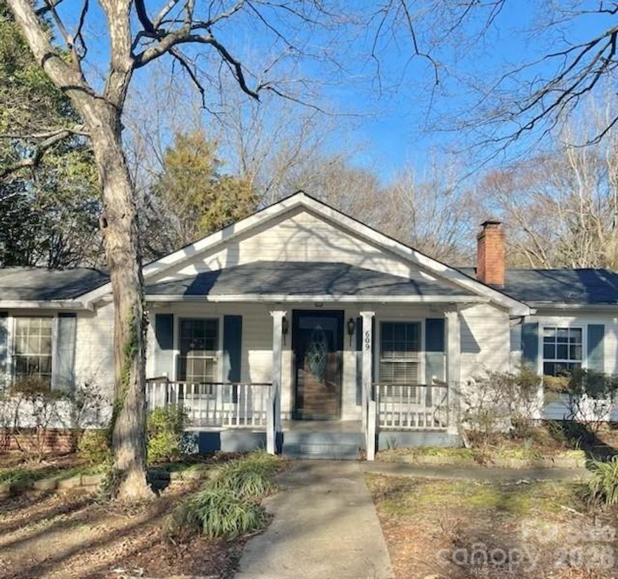 A cozy cottage in an established residential neighborhood in the city limits of Concord. Built in 1939, the property offers both vintage charm and renovation potential. The home features 2 bedrooms and 1.5 bathrooms on a single level, with approximately 1,096 square feet of living space. Traditional interiors include carpet, hardwood and linoleum flooring. A gas fireplace in living room and ceiling fans along with central heating and cooling make for comfort no matter the season. Roof was replaced in 2023 or 2024 per seller. Set on a quarter-acre lot with mature trees, the property includes a detached 2-car garage. Yard is partially fenced in with an 8 ft privacy fence. Enjoy the peace and quiet on your front or back covered porch or concrete patio. Laundry is conveniently located in the mudroom right off the driveway.
This home needs some updating but the right person could make it truly a wonderful home. Schedule your showing today.
Items in the garage do not convey.
*** Additonal parcel added Parcel ID 5529-55-6593-0000  for a total of approx .55 ac.