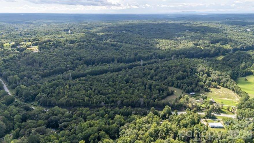 59+ acres of private, unrestricted land situated in Pacolet, SC just over the Cherokee County line. This property offers a quiet, rural setting well-suited for hunting, recreation, or long-term land investment. The creek provides a natural wildlife corridor and enhances the usability and character of the land. With no HOA or deed restrictions, buyers have the freedom to use the property as they choose. The property’s boundary is defined by a creek that also serves as the Spartanburg/Cherokee County line, creating a natural buffer and an added layer of privacy. This central location allows convenient access to Spartanburg amenities while benefiting from a less congested, rural environment and lower property taxes. Ideal for outdoor enthusiasts or future development.