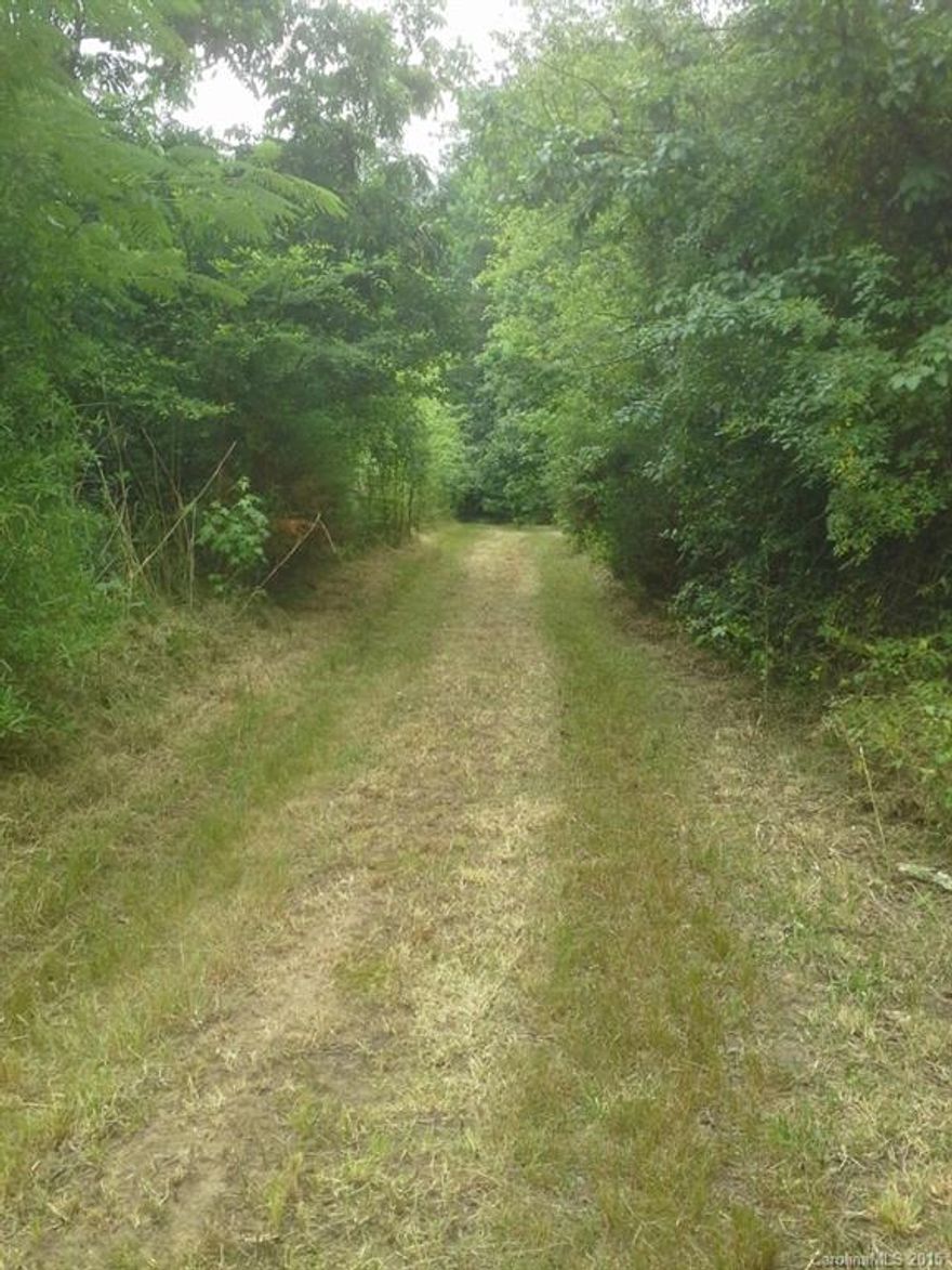 Highly sought after land in desirable Davidson to build a dream home! The land includes four parcels. Legal easement to Barnhardt Rd. Parcels #00715209, 00715213, 00715214, 00715215 included. Tax value is for all four parcels.