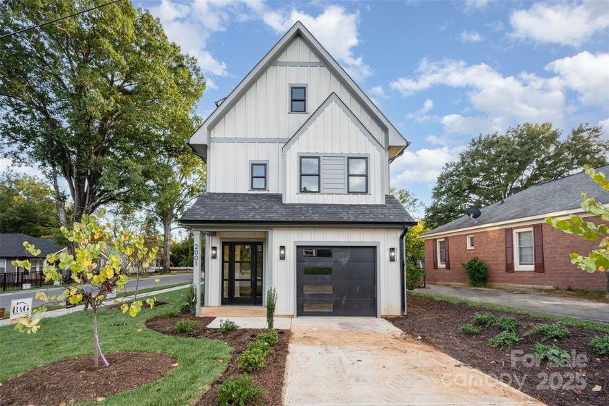 This amazing new construction is a modern-style townhome in historic West Charlotte, and NO HOA. Over 2,400sqft of living space, 4 bedrooms and 3.5 bathrooms. Thoughtfully curated interior finishes. Neutral tones with pops of contemporary color. A bright, light-filled entryway with a glass front door. Entryway custom built-ins with open cabinets, bench and hooks. An open main living area with 10ft ceilings invites people to gather. The modern neutral-toned fireplace wall is a great focal point of the room. Gorgeous Calacatta quartz countertops & custom white cabinetry add brightness to the kitchen & bathrooms. Beautiful contemporary green accents, champagne bronze fixtures, and bronze hardware in the kitchen & bathrooms. Oak wood plank flooring throughout the entire home. The kitchen features tall cabinetry, an island with cabinetry and seating space, white tiled backsplash, a gas range, stainless steel appliances & pantry closet. Modern floating vanity in the powder room adds style. On the second floor, the primary suite has a spacious bedroom and bathroom with luxurious soft-toned tile, champagne bronze fixtures, spa shower w/ rainfall shower head, tiled bench & glass door. Two additional bedrooms on the second floor. The full secondary bathroom is beautifully tiled, with dual vanity and linen cabinet. The third floor is a space of its own - with an open Loft, bedroom, and a full bathroom. Garage w/ EV outlet. See the full feature list for this incredible home! Our preferred lender is offering $20,000 towards closing costs and interest rate buydown, or 100% Financing with no PMI. Contact the preferred lender for details. 2001 Renner Street is part of a modern duet, a corner lot with a private entry. Brand-new construction, no HOA and no CCRs. Centrally located with quick access to all our vibrant Charlotte neighborhoods have to offer! The other townhome in this duet is also available - 1121 Condon St. MLS #4309590. The full Duet is listed as MLS #4312433.