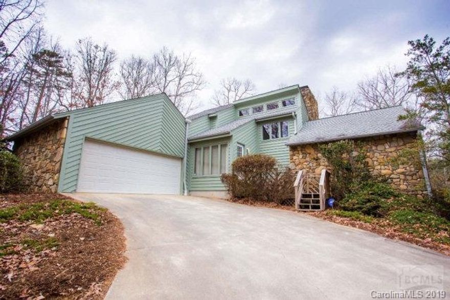 *** OKAY FOLKS; HERE'S YOUR SUMMER SPECIAL!!! JUST REDUCED $75,000 FOR QUICK SALE*** This is a contemporary custom built home on 4.21 acres. It is located just outside the city limits of Valdese but within walking distance to downtown. You have to best of both worlds here; close to downtown but secluded enough to enjoy the privacy of the outdoors. Once you enter from the foyer, this area opens to a large living room with a River Stone fireplace reaching from the floor to ceiling. Lots of windows make this area more appealing during sunrise and sunset. The master bedroom has a fireplace, large master bath and plenty of room for bedroom furniture. The kitchen, breakfast nook and formal dining rooms hardwood flooring has been recently refinished.The laundry room is located on the left as soon as you enter the home from the garage. A Jack and Jill bathroom separate the two bedrooms upstairs.  This home has a full basement with plenty of opportunities to expand your living area. Two-car gar