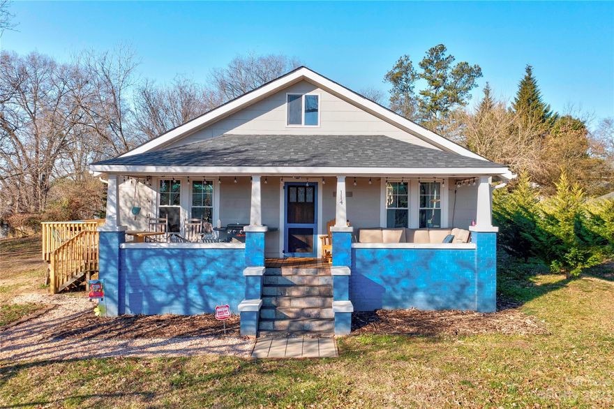 Welcome to your new home! This charming bungalow with over 1500 square feet is nestled on a spacious corner lot, offering both character and convenience. This property presents a fantastic opportunity for those seeking a cozy residence with unique features. Step into a warm and inviting living space that features vaulted ceilings, exposed wood beams, LVP flooring and a spacious open floor plan. The kitchen has plenty of cabinet space, butcher block countertops, and an eat in dining area, as well as a walk in Pantry that leads into the Laundry/mudroom. This home offers  2 bedrooms and a potential 3rd bedroom/flex space option and 1.5 bathrooms. The master is spacious, and has a walk in closet one could only dream of. The recently updated wood deck is perfect for cookouts and family gatherings, and don't forget about the front porch being the ideal place to drink your morning coffee. Don't miss the chance to call this charming bungalow on a corner lot your home. Schedule a showing today!