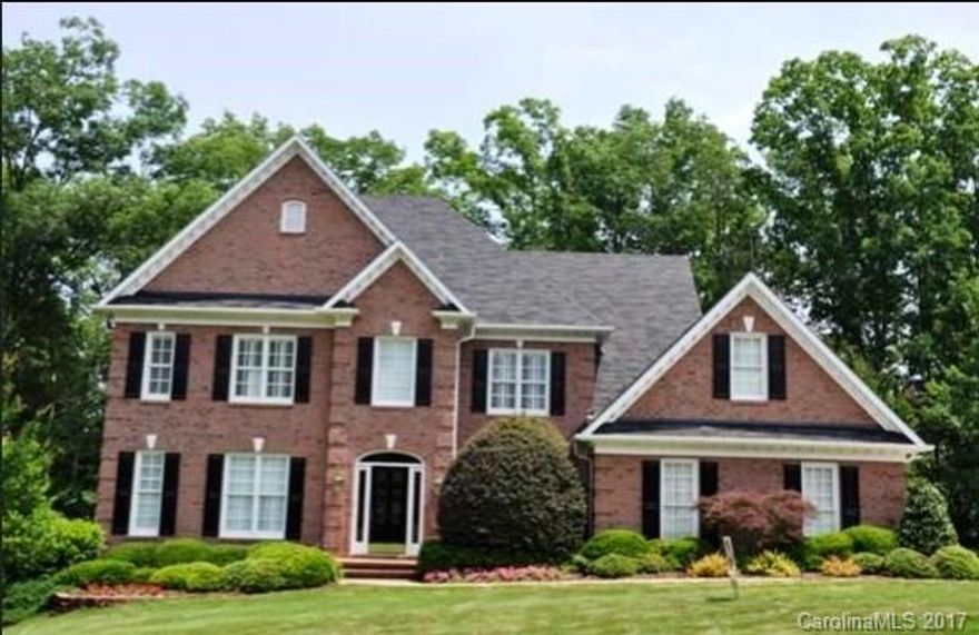 Full Brick 2 Story w/Master on Main Level, Vaulted Great Rm with all the bells and Whistles, Kitchen w/Granite Counter Tops, Tile Backsplash Viking Gas Cook Top, Screen Porch Overlooking Woods, Multi Level Deck 1st Floor Study, .71 Acre Wooded Private Lot, Bonus Rm and also a Playroom.  Park like setting with fabulous view of woods.