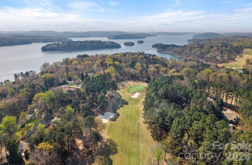 Located within the prestigious Uwharrie Point community and perfectly positioned along Hole 11 of the Old North State Golf Club—part of the exclusive McConnell Golf network—this full brick home offers a blend of timeless construction and thoughtful updates. The recently remodeled kitchen serves as the heart of the home, featuring dual islands designed for both functionality and gathering. Hardwood floors span the entire home! You will also find the primary suite on the main level, offering both convenience and privacy on the main living floor!

Enjoy outdoor living on the Trex deck, ideal for taking in golf course views, while the newer roof provides peace of mind. The garage has been upgraded with durable epoxy flooring, completing a home that has been meticulously maintained and move-in ready.

Beyond the home itself, Uwharrie Point offers a lifestyle that is hard to match—nestled along the shores of Badin Lake and surrounded by the natural beauty of the Uwharrie National Forest. Residents enjoy access to boating, fishing, hiking, and scenic trails, all just moments from their front door. Whether it’s a day on the water, a round of golf, or a peaceful walk through the forest, this location delivers a perfect balance of luxury living and outdoor adventure.

All Photos and Measurements will be uploaded Friday.