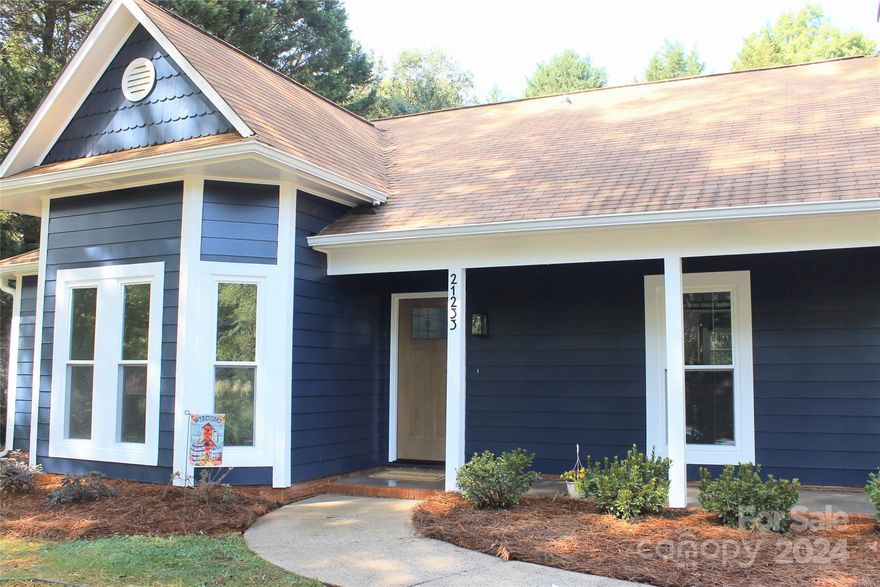 Must-see beautifully remodeled ranch home on quiet cul-de-sac in desirable Cornelius!  Discover this stunning 1,382 Sq Ft   completely remodeled interior (August 2024) includes a flat, fenced back yard. Ready to move in! 

Roof has new flashing, boots, and chimney cap.  All new windows, exterior doors.  All New LVP flooring. Primary bath is completely remodeled with floor-to-ceiling ceramic tile shower, dual sink vanity, mirrors, toilet, and Bluetooth-enabled can fan.  Custom Primary closet.  Second bathroom has a newly updated tub and surround, vanity, mirror, toilet, and Bluetooth-enabled can fan.  Gorgeous kitchen remodel featuring white shaker-style cabinets-soft close doors/drawers, quartz countertops (seats 4), new LG appliances (range, dishwasher, microwave, and refrigerator).  Dining area. Wood-burning fireplace.  All new light fixtures throughout. New Honeywell Wi-Fi enabled thermostat.  Freshly painted with Sherwin Williams paint throughout (interior and exterior).