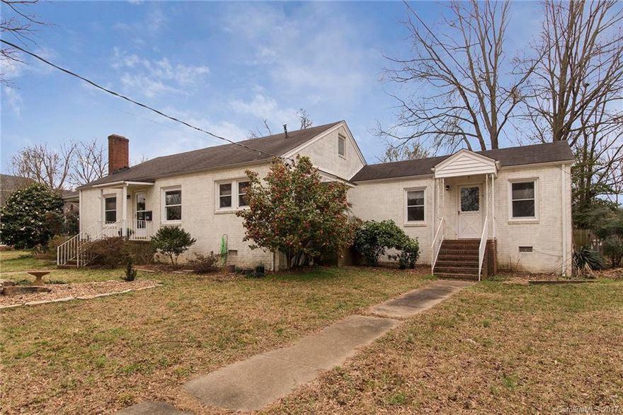 All brick ranch near charming downtown Mooresville.  Remodeled kitchen & baths with new cabinetry, tile & granite.  Original refinished hardwoods throughout home.  Warm & inviting living area w/ WB fireplace.  Private master suite with newly appointed bath including dual vanity & oversize soaking tub.  2 secondary bedrooms share 2nd bath.  Plus there's a cozy family room.  Lots of Character in this well-maintained home!  Walk to town and enjoy the community lifestyle!