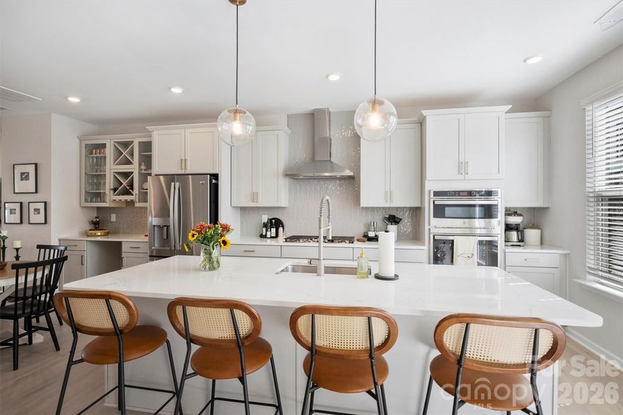 Experience refined living in this 2024-built townhome perfectly positioned to enjoy the best of Davidson’s vibrant lifestyle. Just steps from shops, restaurants, grocery stores, and the charm of Davidson’s community events, this home blends modern convenience with small-town appeal.
Offering a four-bedroom, 3.5-bathroom layout, this residence features an open-concept design highlighted by a gourmet kitchen with a gas cooktop, stainless steel exhaust hood, serving area, and a double-sided pantry for exceptional storage. Elegant finishes continue throughout with wood stair treads, quartz countertops, and an inviting balcony off the main living area, perfect for morning coffee or evening relaxation.
The spacious primary suite boasts a large walk-in closet and an extended walk-in shower for a spa-like retreat. A two-car attached garage adds convenience, while the low-maintenance lifestyle allows you to focus on enjoying all that Davidson has to offer—walks to the Farmers Market, dining/shopping on Main Street, and community gatherings, and live music series, just beyond your doorstep.