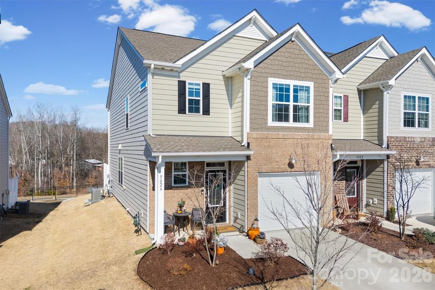 A exceptional end-unit townhome in Windhaven that truly stands apart for its extensive owner-added upgrades, smart-home features, and exceptional care. Built in 2023, this residence offers modern living enhanced by thoughtful details. Smart-home conveniences include a Ring doorbell, re-programmable Level smart front-door lock, and a retractable screen door at the rear entry. The single-car garage features epoxy flooring, and the home is outfitted with dimmer lighting in the entry hall, dining room, kitchen, and upstairs hallway, allowing for flexible ambiance throughout the day. All three bedrooms are hard-wired for internet, supporting today’s work-from-home and streaming needs, and ceiling fans include removable wall-mounted remotes for ease of use. The kitchen is upgraded with a Gallery-series Frigidaire dishwasher, an enhancement over standard builder offerings in the community.  Window treatments have been carefully selected throughout, including Norman roller shades in every room. The owner’s suite features a custom blackout shade system with LightGuard 360, incorporating side channels, a bottom channel, and integrated upper housing to block light seepage. Bath upgrades include a heated, wall-mounted towel rack in the owner’s suite and a curved shower curtain rod in the upstairs bath.  The living area includes a premium swivel/tilt TV wall mount, with a Sony 65-inch television included. Outdoor living has been significantly expanded with a covered rear patio featuring a Hampton Bay 10x10 hard-top galvanized steel gazebo, ceiling fan, and lighting, along with an attached 10x10 Trex deck extension—ideal for entertaining, relaxing, or gardening. A raised herb garden box completes the outdoor space.  This home has been meticulously maintained, is pet-free, and no outdoor shoes have been worn inside, reflecting pride of ownership throughout.