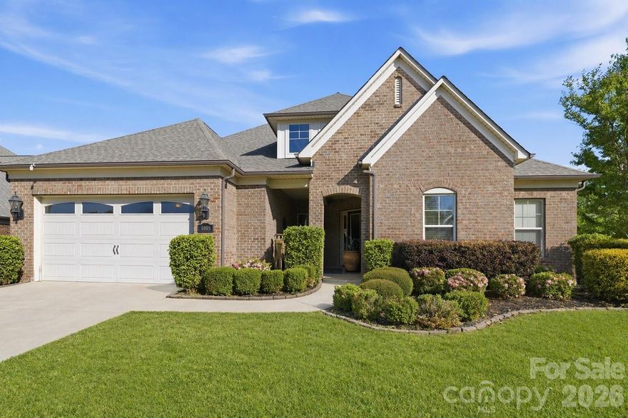 Stunning and beautifully maintained, this exceptional home in Estates at Audubon offers 3,399 heated square feet, a desirable 1.5-story layout, and thoughtfully designed spaces for everyday living, entertaining, and quiet retreat. With 3 bedrooms, 2 full baths, and 2 half baths, all bedrooms are conveniently located on the main level, while an upstairs loft/bonus room with private half bath adds valuable flexible space.
The main living areas are filled with warmth and character, featuring wood floors, high ceilings, extensive molding, and a coffered ceiling in the living room. The open floorplan flows beautifully from the spacious living area into the kitchen, where a large island with snack bar, gas cooktop, wall oven, abundant cabinetry, and separate breakfast area create a functional and inviting heart of the home. A formal dining room adds elegance for gatherings, while a front den with double glass doors and a separate office area off the kitchen provide outstanding flexibility for work, hobbies, or private study.
The main-level primary suite offers a peaceful retreat with a sitting area, spa-like bath with tub and separate shower, dual vanities, and an oversized walk-in closet. Additional highlights include a drop zone, separate laundry room, covered front porch, rear patio, irrigation, and attached 2-car garage. Located in a community with pool, clubhouse, playground, and sidewalks, this home also offers convenient access to shopping, dining, and everyday amenities.
