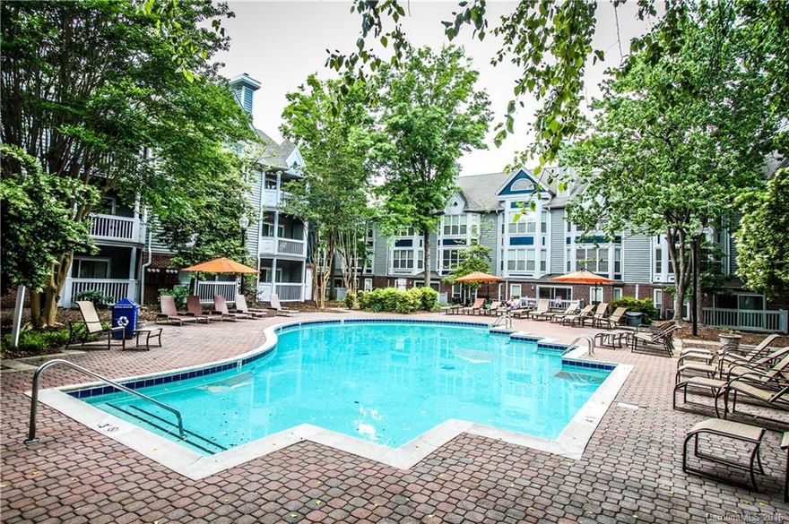 Do you hear that? This immaculate Top-Floor, End-Unit, 4th Ward Condo is calling your name! Enjoy uptown views from both dining and bedroom windows. This marvelous unit has it all...Beautifully angled granite c'tops, SS appliances, wooded balcony, cozy fireplace, open floor-plan, updated bath, wonderful walk-in closet, abundant natural light, remarkably quiet, AND includes Fridge/Washer/Dryer. Pool, grills, fire pit, and Harris Teeter seconds away. You do not want to miss this opportunity!