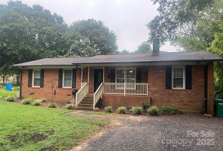 Welcome to Locust.  This charming home is looking for its next owner.  Located on a private dead end Street this home is centrally located to all that Locust has to offer.  The spacious, fenced, lot grants privacy and your own quiet spread to enjoy with your pets or family.  All appliances stay and seller is offering a $2,500 Flooring Allowance due to a soft spot on the floor in front of the dishwasher.  With three bedrooms and two bathrooms this property is ready to host your daily life.  Don't miss the spare room off the Utility Room.  This space is not vented and is not counted in the square footage, but the seller has used a window unit which makes this space comfortable year round.  Seller is also offering a one year Home Warranty for your peace of mind.  Make your appointment today and come check out this quaint home in the heart of Locust.