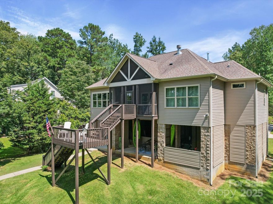 NO HOA! Welcome to lakefront living at its finest on beautiful Lake Wateree. This thoughtfully designed home features a primary suite with large walk-in closet and a luxurious bathroom with a double vanity and spacious shower. The kitchen is both stylish and functional, featuring granite countertops and stainless steel appliances. The living room boasts vaulted ceilings and a striking stone fireplace equipped with gas logs, with the option to burn wood for a more traditional experience. Hardwood floors run throughout the home, with tile in the bathrooms and laundry room for added durability and ease of maintenance. Modern upgrades include an elevator, tankless water heater, home is wired for whole house generator and has a private pier. Set on the serene shores of Lake Wateree, this property offers the perfect balance of elegance, functionality, and opportunity. Great North Road was recently paved. Whether you're seeking a full-time residence or a lakefront retreat, this home is ready to deliver the lifestyle you've been dreaming of.