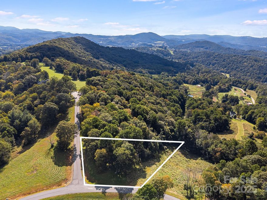 Welcome to your mountain escape in the heart of Boone! Just 10 minutes from downtown, this 1.31-acre lot in the brand-new gated community of Poplar Forest offers the perfect canvas for your future mountain home. With year-round views of the Blue Ridge Mountains, you’ll enjoy crisp mountain air, stunning scenery, and the tranquility of a private setting. The property provides ample flexibility for building your custom retreat, designed to complement the natural beauty that surrounds you. Whether you’re envisioning a full-time residence or a seasonal getaway, this lot offers endless potential. Boone is a hub for outdoor adventure, with hiking, biking, and countless trails right at your fingertips. In the winter months, enjoy nearby skiing and snowboarding at Sugar Mountain and Beech Mountain. When it’s time to unwind, downtown Boone invites you with its charming shops, local restaurants, and vibrant Appalachian State University community events. Don’t miss this rare opportunity to create your own mountain sanctuary - combining privacy, convenience, and unmatched views in one of Boone’s most desirable new communities!
