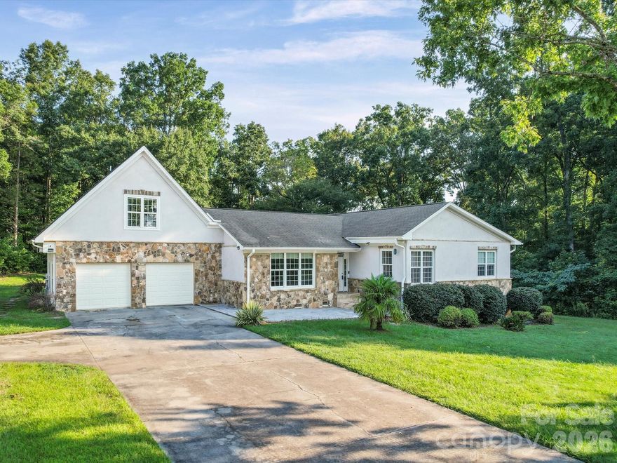 Sellers have done major price reduction! Come tour this gorgeous remodeled home with exterior freshly painted French Gray. This home is located in a culdesac on a large 1.3 acre lot surrounded with trees for privacy. The home has been updated throughout, in the kitchen features a vaulted plank ceiling, shaker cabinets, stainless steel appliances, stainless steel farmhouse sink, and granite countertops with a large island. The living room has hardwood floors, wooden beams and a decorative fireplace. The floor plan is split on one side up the stairs the primary suite is located with a grand tiled shower, double vanity, and walk in closet. On the other side there are  three  additional bedrooms, family den, and bathroom (4th bedroom w/o closet) The basement is being used as a media room and gym, but could be used as a second living quarters it has a full bathroom. Outside enjoy the large beautiful travertine tile patio with a large fire pit, perfect for entertaining guests. Great location close to shopping and restaurants.