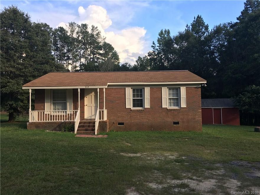 Great one story 3 bedroom, 1 bath brick home on large flat lot. Has hardwood floors and fresh paint. 10 x 20 outbuilding.