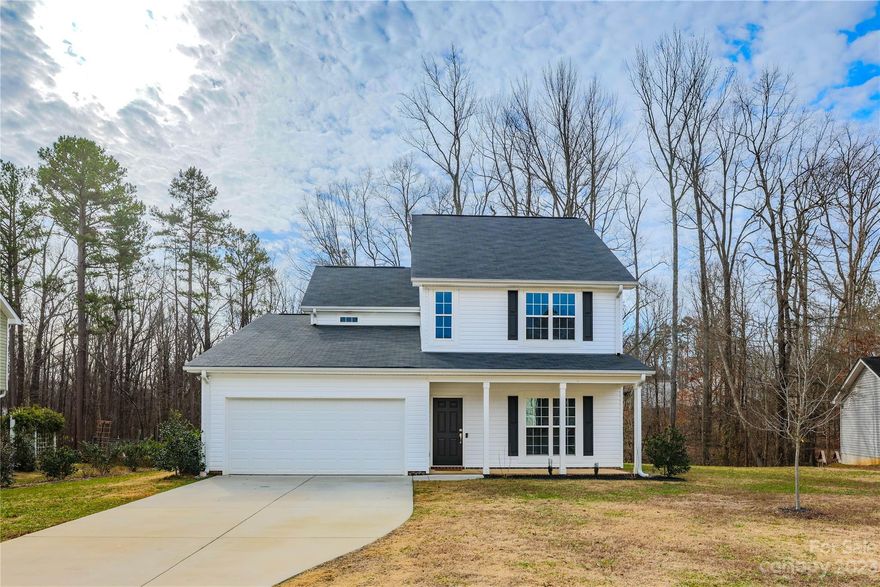 This charming, move-in ready home offers a perfect blend of style and functionality with its open-concept floor plan. The living space is bright and inviting, with large windows allowing natural light to flood in creating a comfortable space for entertaining. Each large and spacious bedroom boasts a walk-in closet, providing plenty of storage space. The private wooded backyard is perfect for outdoor activities or just relaxing in the serene atmosphere. The deck has been recently updated with new composite decking boards, which means low maintenance and more time to enjoy the outdoor space. This home is conveniently located just minutes away from schools, restaurants, and shops, making it the perfect place to call home.