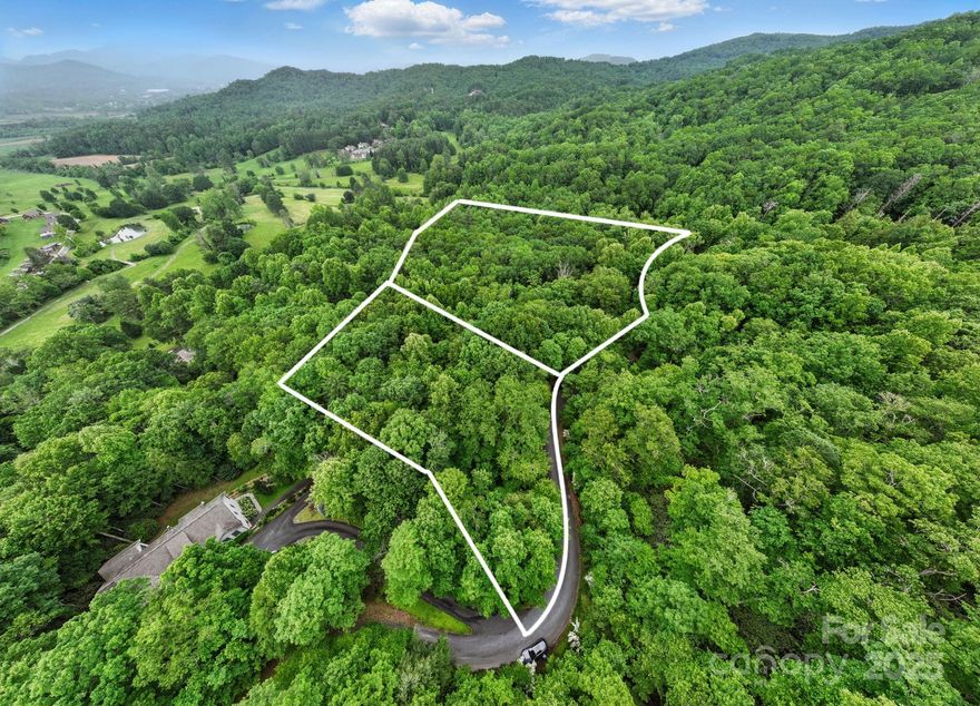 Don’t miss this incredible opportunity to own 3 acres across two picturesque wooded lots in the highly desirable Glenn Cannon neighborhood! One lot is already cleared and prepped for your dream mountain home, featuring a 5-bedroom EOP septic system, roughed-in driveway, and erosion control measures already in place.

The homesite and well location have been professionally determined based on soil scientist recommendations, saving you time and effort. A peaceful stream runs along the property line between the two lots, and the natural setting is home to abundant wildlife—including frequent visits from deer—offering a true mountain retreat feel.

Enjoy the perfect blend of privacy, natural beauty, and convenience in an established community. Whether you're ready to build now or plan for the future, this property is ready to bring your mountain home vision to life.