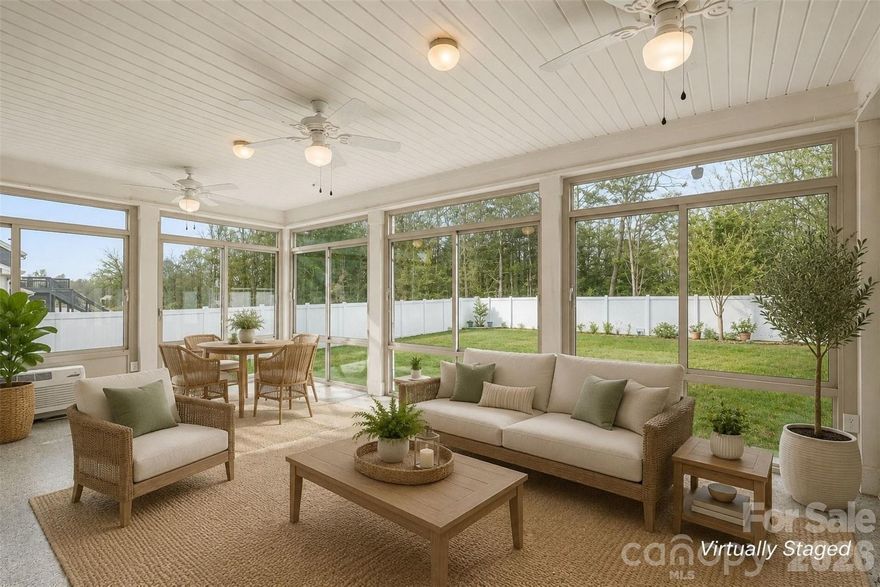 Luxury living meets peaceful privacy in this stunning 5-bedroom, 3.5-bath Hardie Plank home offering approximately 4,300 square feet of beautifully upgraded living space on a premium flat lot. From the heated and cooled sunroom with floor-to-ceiling windows to the lush landscaped backyard backing to trees, every detail of this move-in-ready home was designed for comfort, elegance, and effortless entertaining.

Boasting 5 bedrooms, 3.5 bathrooms, and approximately 4,300 square feet, this home blends elegance, functionality, and room to grow. Inside, you’ll find soaring 9-foot ceilings on both levels, rich LVP flooring throughout the main floor, and an inviting open layout filled with natural light. The spacious owner’s suite is a true retreat with a tray ceiling, spa-inspired bath featuring a 6-foot soaking tub, and an oversized custom-style closet. A front bedroom with its own ensuite offers the feel of a “mini” primary suite, while the large 5th bedroom/game room provides incredible flexibility for guests, hobbies, or work-from-home living.

One of the home’s standout features is the heated and cooled sunroom surrounded by floor-to-ceiling windows, creating a bright year-round indoor-outdoor living space. The upper windows are tempered for energy efficiency and can open for airflow. Just outside, the covered back porch with ceiling fan overlooks peaceful trees, offering exceptional privacy and a quiet retreat perfect for entertaining or relaxing evenings under the stars.

The kitchen is thoughtfully upgraded with a Whirlpool fingerprint-resistant refrigerator featuring filtered water and an ice maker, along with a Culligan whole-house filtration system and alkaline water system at the sink.

Outside, the meticulously maintained landscaping creates a true private oasis with lush fescue grass, remote-operated Rain Bird irrigation, custom brick and paver flower beds, mature crêpe myrtle trees, over a dozen Knock Out roses, vibrant seasonal blooms, and elegant white vinyl fencing.

Located at 2120 Katie Alice Circle, this home offers the perfect balance of peaceful suburban living with convenient access to everything Charlotte has to offer. Uptown Charlotte is approximately 35–45 minutes away, while Ballantyne, Waverly, South Charlotte shopping and dining, Sun Valley Shopping Centers, and Charlotte Douglas International Airport are all within easy reach. Charming Downtown Waxhaw, with its boutiques, coffee shops, salons, and community events, is just minutes away.

With major upgrades already completed, this exceptional home is truly move-in ready and combines luxury finishes, modern functionality, and beautiful outdoor living into one incredible opportunity you won’t want to miss.