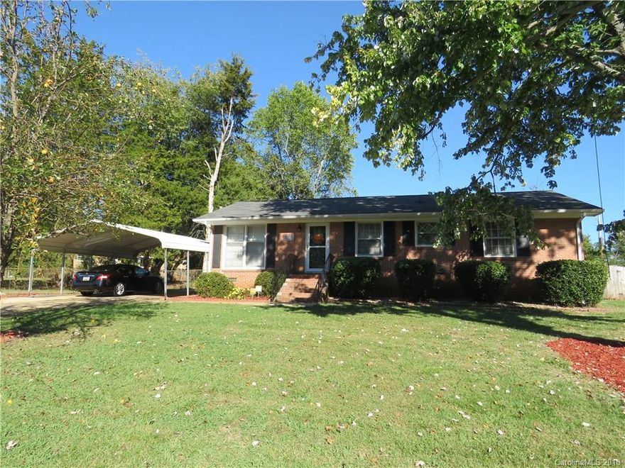 Home is cute as a button and neat as a pin - features hardwood and/or laminate wood floors throughout, fenced in back yard, double carport and a nice wired, utility building included in the sale.