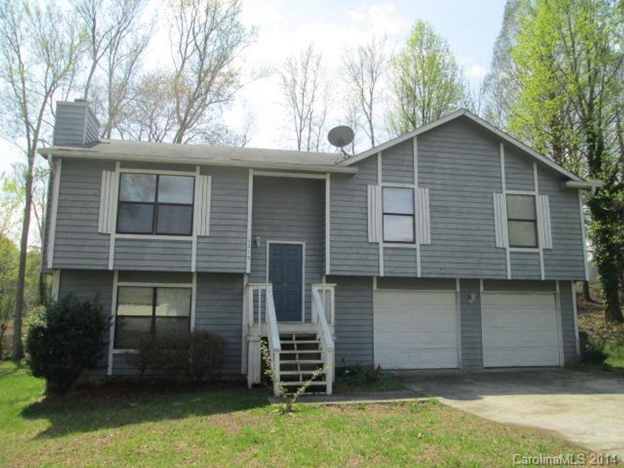 Fresh paint, new carpet. Stone fireplace. Deck. Bonus space downstairs with fourth bedroom. Walk Score: 22 (car dependent). $200 Pet fee is per pet that does not exceed 30 lbs.