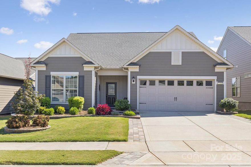 Lots of Upgrades and Move-In Ready! 
Step inside this meticulous 3BR/3BA home located on a cul-de-sac. All flooring downstairs has been replaced. Interior walls have been repainted - no more builder-grade paint. A versatile Flex Room with custom office-style built-ins provides an ideal space for work or hobbies. The open Kitchen, Eating Area, and Living space provide ease and functionality. All appliances have been upgraded - stove, microwave, Bosche DW - the Refrigerator remains. Sunroom overlooks the common area in the back. The screened porch has cafe lights and an upgraded epoxy floor, and an extended patio where you can relax and enjoy peaceful views with no one behind you.  The owner's spacious ensuite bedroom has a tray ceiling, and a wall of windows overlooking the back -tiled shower, a granite vanity, and a large walk-in closet complete the bath area.

Upstairs is an open Loft, Bedroom, and Full bathroom, which are accessible through the French door in the main level foyer. Additionally, the large storage area is being used as a small kitchen. 
Upgraded landscaping with stone edging, gutters, a separate water meter for the irrigation, and, of course, the resort style amenities offered - indoor/outdoor pools, tennis and pickleball courts, bocce ball, corn hole, fitness classes, workout room, shuffleboard, meeting rooms, various social clubs and activities, and more.