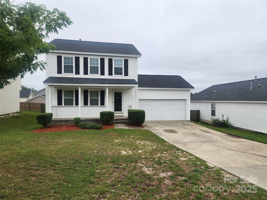 Let's make this spacious three bedroom house your home!!! It has two full bathrooms upstairs and a half bath on the main level. There are wood vinyl floors through the living room and dining area for easy clean ups. There is a newly installed microwave and dishwasher. The half bath is off the sides of the laundry area. No need to be concern about moving a refrigerator or washer and dryer, as this home is leaving those items just for you. There is a deck that overlooks the  privately fenced backyard, all waiting for you to do some entertaining. The driveway is long and the garage is spacious. What are you waiting for? Come get your home, it's waiting for you!!!