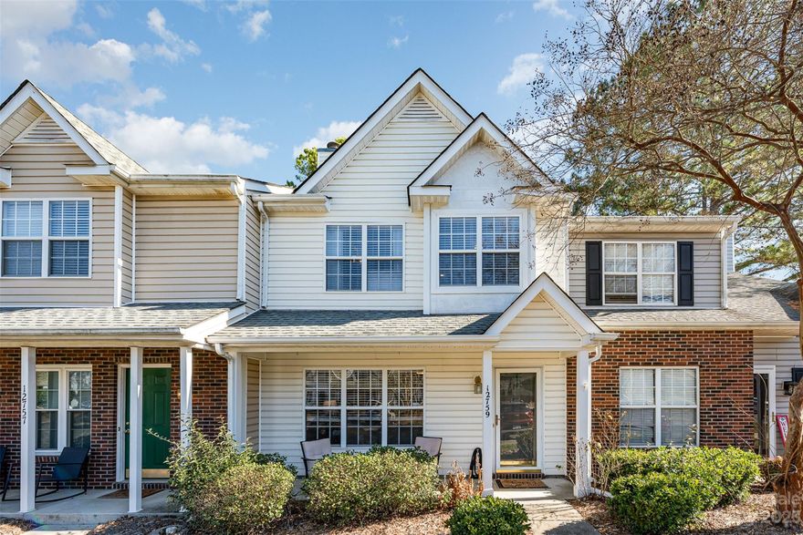 Have you been looking for an updated townhome in a convenient location?  This is the one...close to shopping, restaurants, the airport, uptown and more.  This low maintenance 3 bed / 2.5 bath townhome includes hardwoods throughout, neutral paint, ceiling fans in all rooms, new appliances, new cordless blinds and many other features.  Relax or entertain on your private back deck which has been completely redone with wood decking and new fencing.  Play with your pup at the community dog park and then go for a dip in the pool to cool off (once it warms up).  For now hang out in the living room by the fireplace to beat the winter weather.  Come check it out and make it yours.