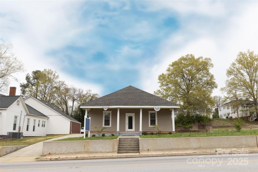 This versatile commercial space is perfect for general office space or a medical office. Formerly a residential home, it has been thoughtfully converted into a functional office, featuring multiple private offices, a conference room, a break room, a kitchen, and bathroom. The layout is designed for productivity and comfort, with ample storage space for your business needs. The property has been extensively renovated with new flooring, sheetrock, HVAC, a commercial water heater, and updates to plumbing, electrical, and windows, all completed in 2023. It also includes parking for 5-6 cars, providing easy access for clients or staff. The charming front porch adds to the welcoming curb appeal. Located close to restaurants, banking, and other local businesses, this property offers added convenience for your team and clients. Currently leased at $1,700/month with 2 years remaining.