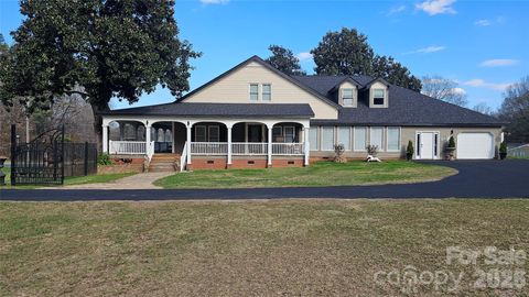 Photo of 1310 Main Street E, Locust, NC 28097 (MLS # 4360987)