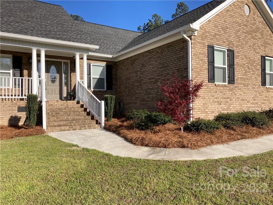 ****Back on the market Due to No Fault of the Seller.*** Philliptown offers this nice quite neighborhood and almost new all brick home, 2 car garage. Home offers an open floor plan, for family to play together. Large kitchen with plenty of storage, all appliances, large island w bar stools, and dinning area, for enjoyment. Back door opens to a screened in porch, great for sipping coffee and watching the wild life, or for those summer sunsets. Fenced area in back perfect for animals and the kids. Large enough for that always wanted pool. 5+ acres approx. 1 acre cleared. No restrictions, bring the animals. 3 large beds 2 1/2 baths. Master w tray ceiling and can lights completes the beauty of the room, w walk in closet. Master bath is large w garden tub and walk in closet. Bonus room perfect for an office. Tankless water heater. This home has too many features to mention. Call me for your app today I promise you won't be disappointed! Comporium Hi Speed Internet!