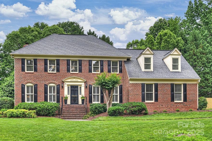 Beautiful full-brick traditional home with 4 bedrooms, 2.5 baths, and spacious bonus room, all nestled on a beautifully landscaped lot with a level and private backyard—perfect for relaxation or hosting. Step inside to find gleaming hardwoods, a generous family room perfect for gatherings, welcoming kitchen and breakfast area overlooking the patio and picturesque backyard and inviting living & dining rooms; ideal for entertaining. Dual staircases offer convenient access throughout the home—especially the back staircase leading to the bedrooms and the sprawling bonus room. This versatile space is large enough to accommodate a home gym, playroom, or home office. The large primary suite is filled with natural light and offers a peaceful retreat. Just minutes from The Promenade, Providence Commons, Blakeney, Stonecrest, Waverly, Rea Farms, Arboretum, & I-485. Full irrigation. Award-winning South Charlotte schools! Berkeley is one of the most beloved neighborhoods in all of South Charlotte!