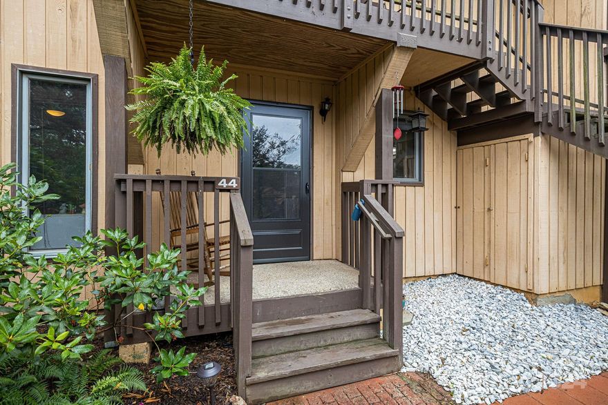 Welcome to this beautifully updated 2-bedroom, 2-bath condo, nestled at the back of the neighborhood for ultimate privacy. The open floorplan seamlessly connects the living areas, creating a spacious & inviting atmosphere. The kitchen has been completely redone with all-new cabinets, granite countertops, & a stylish tile floor. This home boasts recent upgrades, including a new water heater & fresh paint. The sunporch, heated with baseboard heat and featuring a ceiling fan, offers year-round enjoyment & adds valuable living space. An unfinished storage area off the sunporch provides ample storage. Enjoy outdoor living on the patio and take advantage of the raised garden beds on the side of the building to grow vegetables or flowers. Located in super convenient South Asheville, this condo offers easy access to shopping, dining, & all the amenities the area has to offer. The seller is providing a one-year home warranty from 2-10 Home Warranty, ensuring peace of mind for the new homeowner.