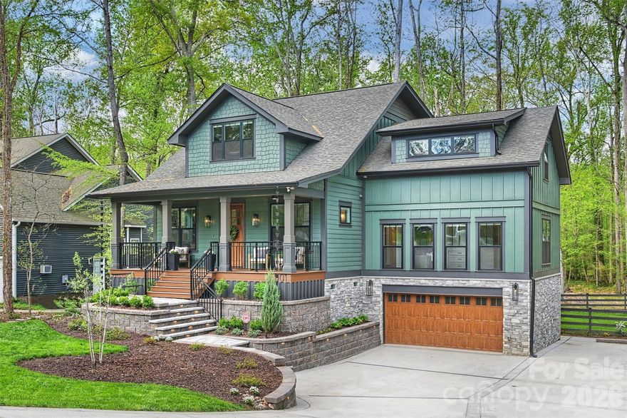 Experience a rare fusion of expansive privacy and modern luxury situated on an unprecedented 2.5+ ACRES in South Charlotte. Inside you will find an open floor plan defined by impeccable craftsmanship and high-end custom finishes throughout. The main level is anchored by stunning 1/4 sawn white oak hardwoods and extensive custom carpentry that adds a layer of timeless texture to every room. The chef’s kitchen is a showstopper, featuring an oversized custom island perfect for entertaining. Premium finishes and professional-grade appliances throughout with a seamless flow into the living areas full of natural light. Designed for modern flexibility, this property includes a sought-after Junior Primary Suite on the main level in addition to a Second Floor Primary Suite that is a true sanctuary featuring a freestanding soaking tub and a rainfall shower. Outdoor living is unmatched boasting a serene covered front porch and sprawling rear deck perfect for entertaining. Experience the impossible: massive acreage, new construction, and a prime South Charlotte location. Nestled in the tranquil Carmel Forest neighborhood and situated just moments from Carmel Country Club, this property offers a level of privacy that is simply unheard of for this location. This isn't just a home; it is your own personal oasis, providing a serene, escape while remaining minutes from the city's finest dining, shopping, and amenities.