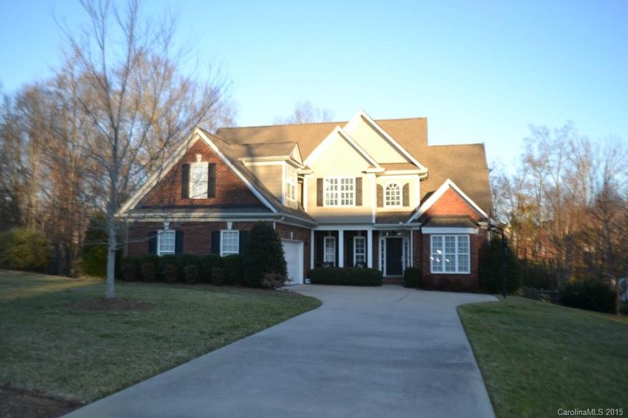 Stunning home loaded with upgrades & detail. Gleaming hardwood floor in 2 story great room with brick fireplace. Open eat in kitchen with Corian counter tops, 42" cabinets, tile floor & back splash all with views into formal dining & great room. Master suite on main level features trey ceiling, walk in closet & spa like deluxe bath. Guest suite & full bath also on main level. 2 spacious bedrooms & bonus room upstairs. Screen in porch overlooks fenced yard, deck & patio with built in fire pit.