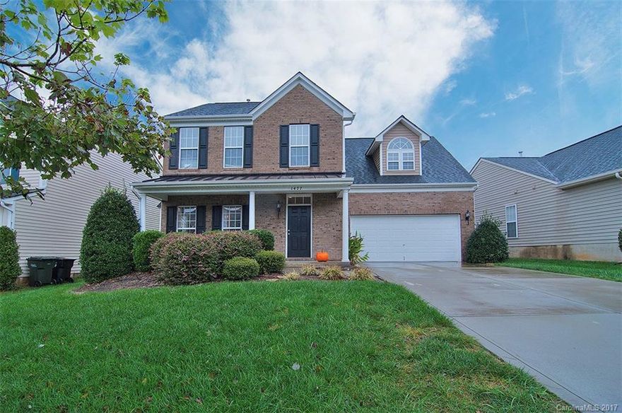 Fantastic home in amenity-filled Moss Creek within A-rated school district. Gorgeous brick-front, two-story boasts hardwoods, Corian, sunroom, huge bonus and upstairs laundry!  Flat, fenced back yard has ample room for entertaining. All bedrooms are upstairs and bonus room occupies a separate space above the garage.  First floor is open and includes a sunroom with vaulted ceiling - use as an office, playroom or extra living space. Enjoy year round swimming, slides, tennis, clubhouse and more!