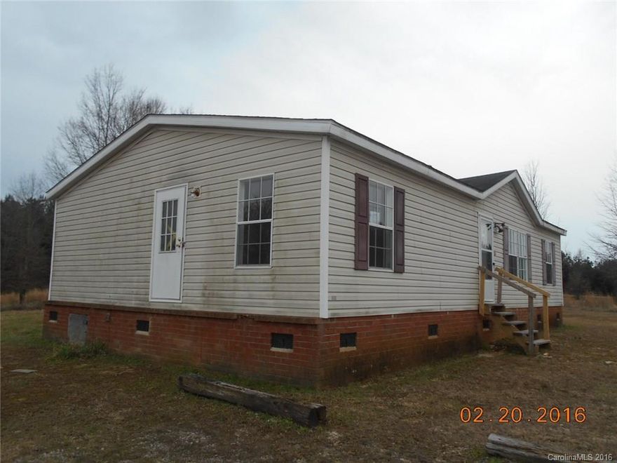 Large open country style kitchen opens to dining area and large living room. Vaulted ceilings. Limited Service listing. Sold as is. Vacant no appointment required.