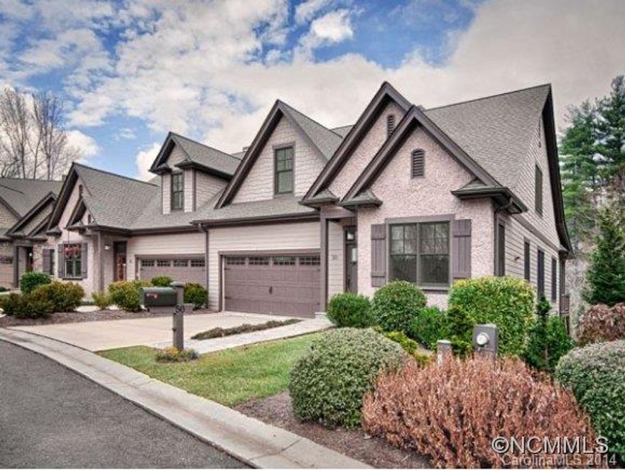 No showings at this time. Village Park! 7 min. to Downtown, 5 min. to new Whole Foods.Asheville Mall.. Nestled high beside creek, fronting the Park. Luxurious Craftsman Cottage Style with casual elegance. This custom home features master on main, hardwood floors, crown molding. Chef's kitchen, granite counters & stainless appliances, vaulted ceilings, custom closets. HUGE 1045 LL w/bath uncounted in SF. Just needs paint & flooring!