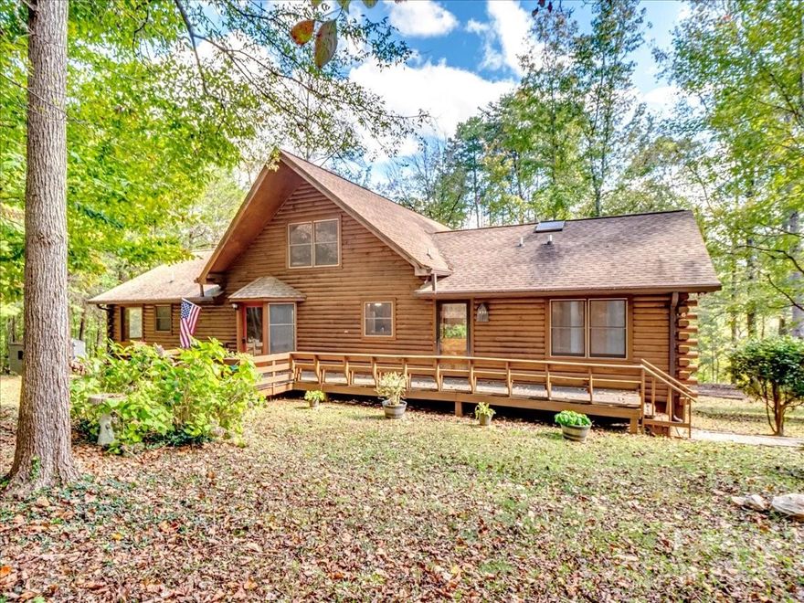 Wonderful Log Cabin Nestled on 6+ Beautiful Treed Acres's that include Water Frontage on a Spring Fed Private Lake. 3 Fireplaces, Great Rm w/Cathedral Ceilings, 2nd Floor Loft, Split Bedrm Plan including Spacious Master Bedrm, downstairs Basement Bedrm w/Full Bath & Separate Exit, Potentially makes this a 2nd Living Area or Mother In Law Suite. Basement Workshop. 2 Relaxing Front & Rear Decks as well as 2 relaxing Docks to Fish for Trophy Bass while enjoying the Views. Low Country Taxes ! No HOA ! Horses & certain Farm Animals Welcome. New 50 yr Arch Roof that according to former owner was installed 2007. Leaf Proof Guttering System. Septic pumped July 2024, all looked well according to the service company. Home Security System. Only 40 min to Charlotte Douglas International Airport. Comporium High Speed Internet up to 2 Gbps. Paved County Roads ! All information deemed correct but not guaranteed, please verify anything important, including School assignments before submitting an offer