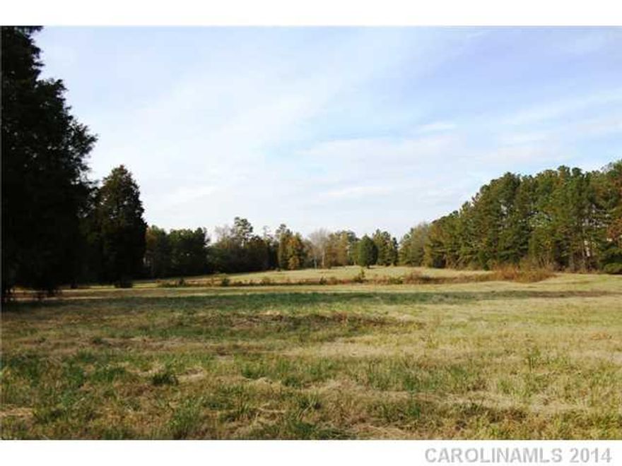 9.52 acres with road front on S.Tryon & touches Wright's Ferry Rd; mostly level, mostly clear cut but bordered by evergreens. Most of land is also bordered by fencing. Great investment opportunity! City water/sewer available. Acreage is near Rivergate Shopping & 49/160 intersection. Adjoining 4 acres also available.