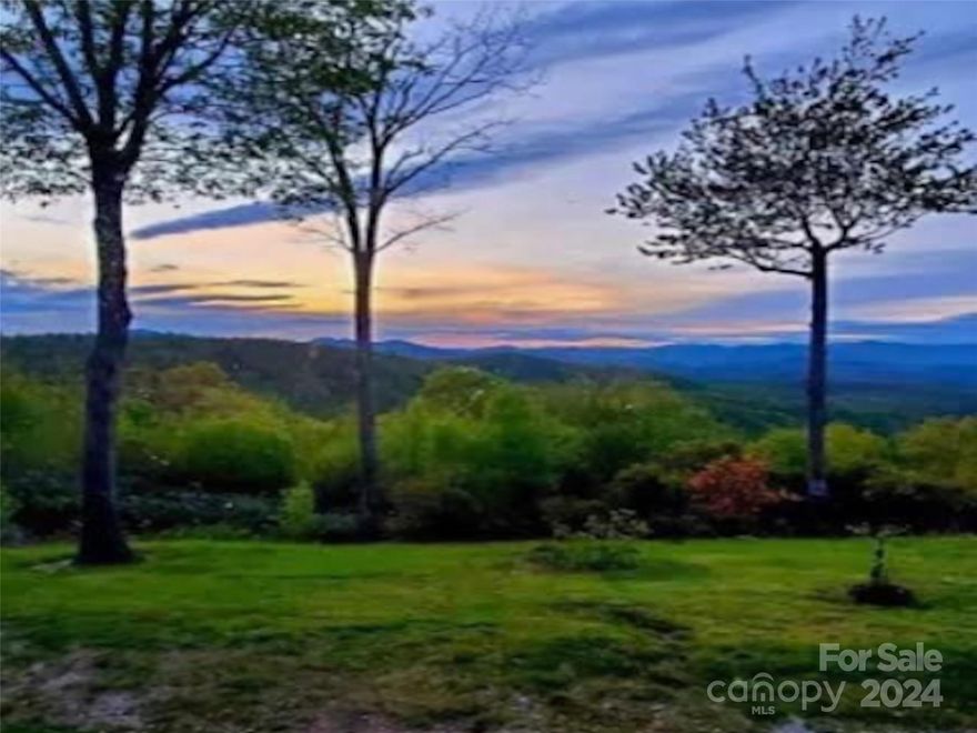 Unrestricted Paradise: Breathtaking Panoramic Views, Natural Spring, Turnkey manufactured home that has been freshly painted, new flooring and updated kitchen that would make it an easy move in ready getaway!!  This home has natural poplar bark siding and wrap around Deck, large attached carport – Just 24 Minutes from Downtown Brevard! Explore the beauty of unbridled freedom on this 5.52 acre property, a mere 24-minute drive from downtown Brevard.  What sets this property apart? Unrestricted use, ensuring your vision for the land remains yours alone, providing the ideal canvas for your dream home. No Homeowners Association (HOA) allows you to have the flexibility to bring your unique vision to life without limitations. Whether you're looking to build your forever home, a vacation retreat, or make a sound investment, this property, with its unrestricted use, offers endless possibilities.