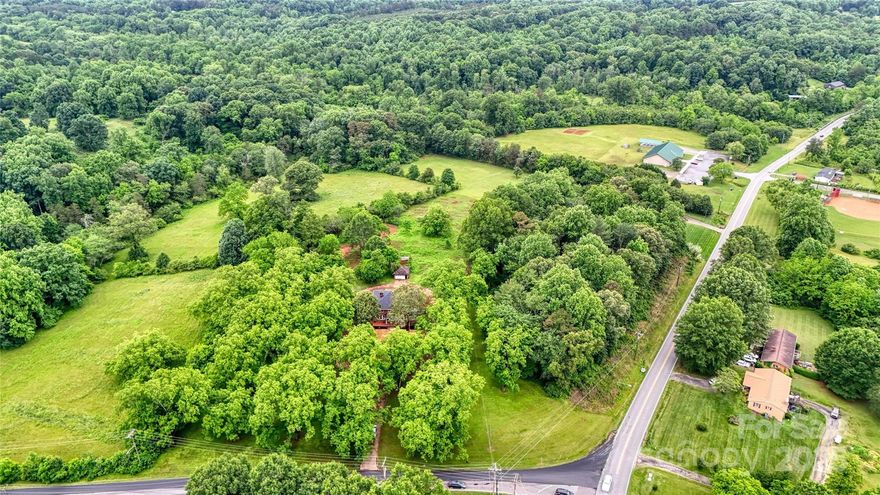 Fully Renovated 5-Bedroom Estate on almost 7 Acres

This stunning 5-bedroom, 3-bathroom estate sits on almost 7 private acres in Newton, NC, offering 3,858 sqft of fully renovated, move-in-ready living space. Every detail has been updated—blending modern comfort with timeless style.

Enjoy a gourmet kitchen with granite countertops and new stainless appliances, an open-concept layout, and restored original hardwood floors. The luxurious primary suite features a walk-in closet and a spa-style bath with a garden tub and separate shower.

Additional upgrades include new plumbing, electrical, insulation, HVAC, roof, windows, and lighting.The expansive acreage offers privacy, space, and endless potential—just minutes from town.