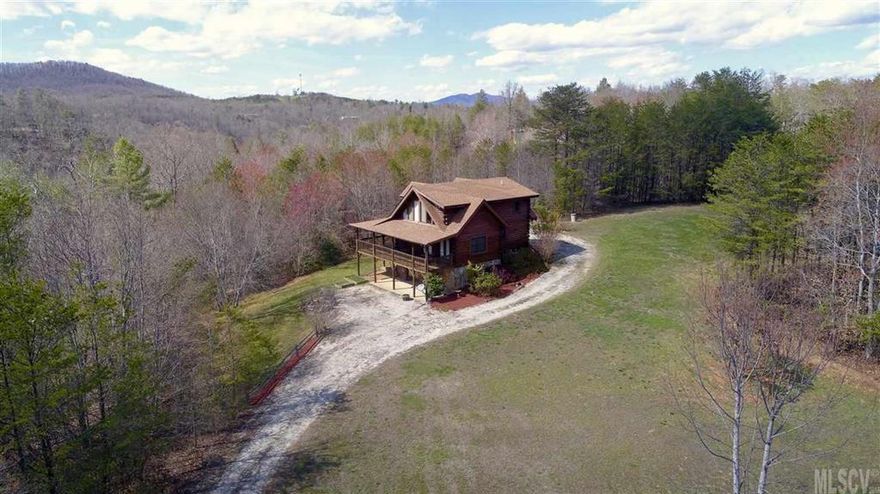 This home is why you live in NC! A fabulous 3Br/3Ba Log home on 2.49 private acres in the gated community of Cascade Highlands. Only 2 miles from I-40. Convenient to Asheville & Hickory. Year round mountain views. Stunning well-maintained Log home with 3 levels of living. Open floor plan w/Vaulted ceilings, Loft overlooking a stone fireplace. Easy entertaining Kitchen w/ all appliances included, dining area with french door access to over 630 sqft of covered decking with mountain views. Spacious Bedrooms and full baths on all three levels. Master on the main. Upper level with a vaulted Bedroom, Full Bath w/walk in closet and expansive Loft area. Full finished Basement with a 3rd Bedroom & Full bath, Separate Office/study that walks out to a covered patio area. Large Laundry room with ample storage through-out the home. Plenty of garden space or recreational play. Community with Creekside & private Lake picnic area. Feel like you are always on vacation but close to all amenities.