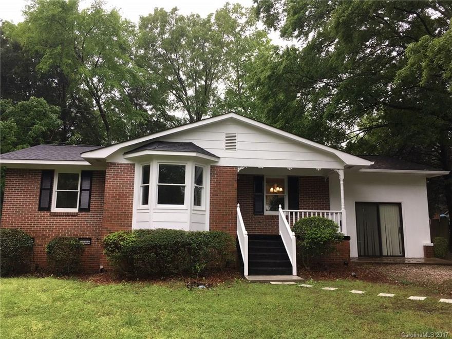 Beautiful recently updated 3 bedroom 1 bathroom ranch. New roof, new electric hot water heater, new flooring throughout the house. Great front porch! Storage building! Really cute house!