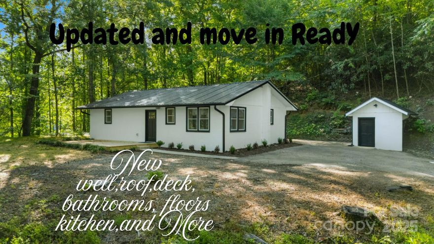 Tucked just minutes from town and the scenic charm of Dillsboro, this beautifully remodeled 2-bedroom, 1.5-bath home offers the perfect blend of comfort, convenience, and outdoor adventure. Thoughtfully updated throughout, the home features a brand-new roof, new flooring, a stylishly renovated kitchen with modern appliances, and fully refreshed bathrooms. A new well pump ensures dependable water service, while the property itself offers several level areas ideal for a workshop, RV pad, or future expansion. Down by the lower section, a charming creek adds a peaceful touch as it gently winds through the landscape. An additional outbuilding provides extra storage or could serve as a small workshop. Whether you're seeking a tranquil retreat or a base for exploring the area's natural beauty, you'll enjoy easy access to the train in Dillsboro and nearby opportunities for rafting, hiking, kayaking, and fishing. This move-in-ready gem is a rare find where modern updates meet mountain charm