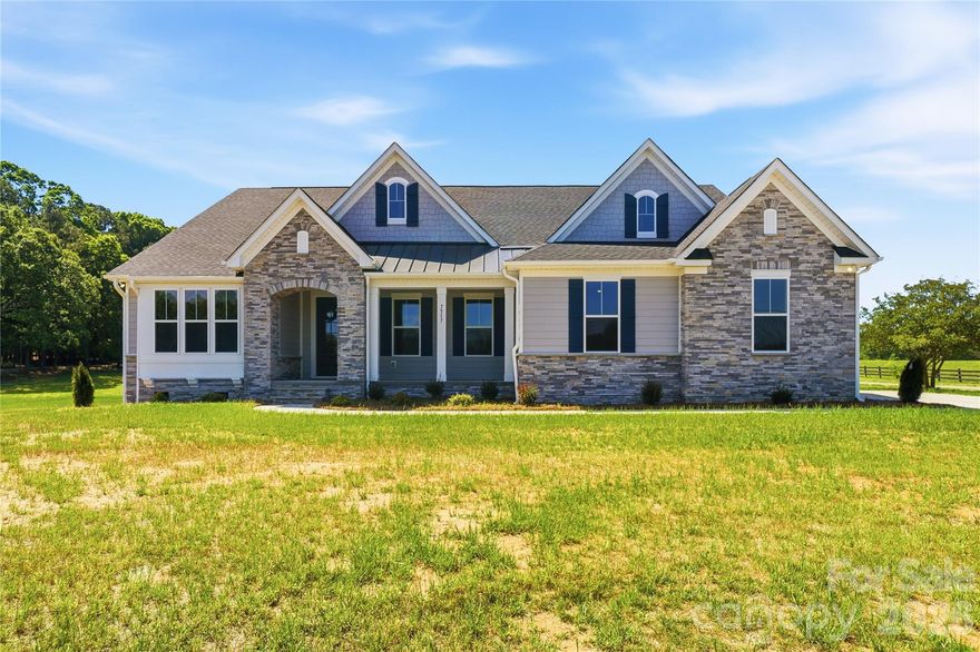 Welcome to the Charleston Plan!

A thoughtfully designed home that blends open, spacious living with warm, inviting details. Even better, there are two brand new homes built side by side, giving you a rare opportunity to choose the one that fits you best. Be sure to also check out the home next door at 7513 Lancaster Hwy.

Located in charming Waxhaw, you get the best of both worlds, peaceful, small town living with convenient access to everything Charlotte has to offer.

Inside, you’re welcomed by a foyer with a formal dining room on one side and a flexible space on the other that could be a home office, playroom, or cozy sitting area. The family room is filled with natural light from a wall of windows and opens right into the gourmet kitchen, where an oversized island and bright breakfast area make everyday living and entertaining feel easy.

The owner’s suite is tucked away for privacy and features a spa like bath with dual vanities, a walk in shower, and two spacious walk in closets. A drop zone off the garage adds convenience, and the unfinished upper level offers approximately 996 square feet of future potential, perfect for a bonus room, storage, or whatever fits your needs.

Just 7 miles from downtown Waxhaw, you’ll enjoy local dining, shopping, and community events while still coming home to a quiet, relaxed setting.

Offering $2,500 in closing costs with our preferred lender for qualified buyers.

This home is complete and move in ready!