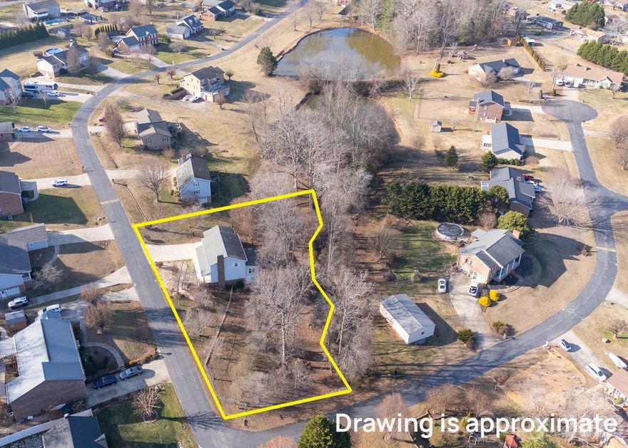 Priced Well Under Both Appraisal Value AND Tax Value!!! Less than 1/2 a mile from Grocery/Gas! Short Drive to Hickory, Valdese, Lenoir, and the High Country! Spacious 2 Story Home in Desirable Hidden Lakes Community! Put your own touch on this large 3 Bedroom 2 & a Half Bath Contemporary Home! Gorgeous flowering perennials & trees decorate the landscape on this larger corner lot w/fenced in back yard, & outbuilding. A rock water feature sits under a canopy of a spring flowering cherry tree. Enjoy watching the ducks at the neighboring pond while getting your steps in for the day! Enter into an over-sized living area w/wood burning fireplace/wood stove insert. The living room flows into the dining room, which has an attached sun room flooded w/natural light! The kitchen has classic white cabinets, stainless steel appliances & granite counter tops! There is a spacious 1/2 bath on this floor & a conveniently located laundry room just as you enter in from the 2 car garage. Upstairs find a large primary bedroom w/en suite. WIC, beautiful walk in shower & large bathroom vanity! 2 additional bedrooms & full bathroom on this level! Full Unfinished Bsmt! Carpets just cleaned. Hurry to see this customizable home today!